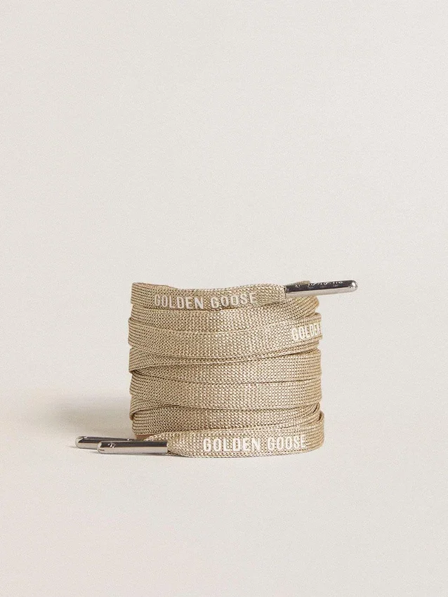 Lacets en lurex doré avec logo blanc contrastant