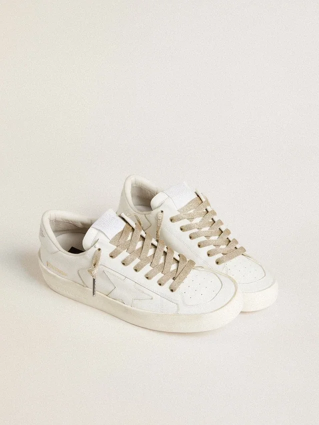 Lacets en lurex doré avec logo blanc contrastant