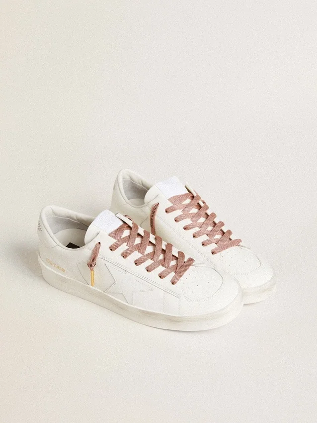 Lacets en lurex rose saumon avec logo noir contrastant