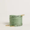 Lacets en lurex vert aqua avec logo noir contrastant