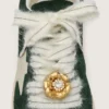 Lacets « Peaux » en mohair blanc avec breloque
