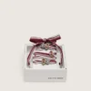 Lacets « Peaux » rayés blanc et bordeaux ornés de breloques
