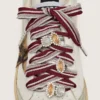 Lacets « Peaux » rayés blanc et bordeaux ornés de breloques