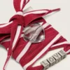 Lacets « Peaux » rayés rouges et blancs avec breloques