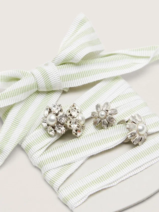 Lacets « Peaux » à rayures vertes et blanches avec breloques