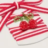 Lacets « Peaux » rouges et blancs avec breloque en forme de cerise
