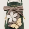 Lacets « Sparkling » marron, noirs et argentés à motif chevrons avec deux breloques appliquées