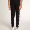 Leggings noirs pour filles avec des étoiles blanches sur les côtés