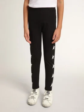 Leggings noirs pour filles avec des étoiles blanches sur les côtés