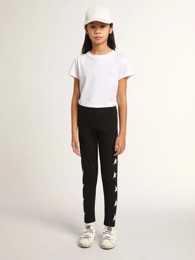 Leggings noirs pour filles avec des étoiles blanches sur les côtés