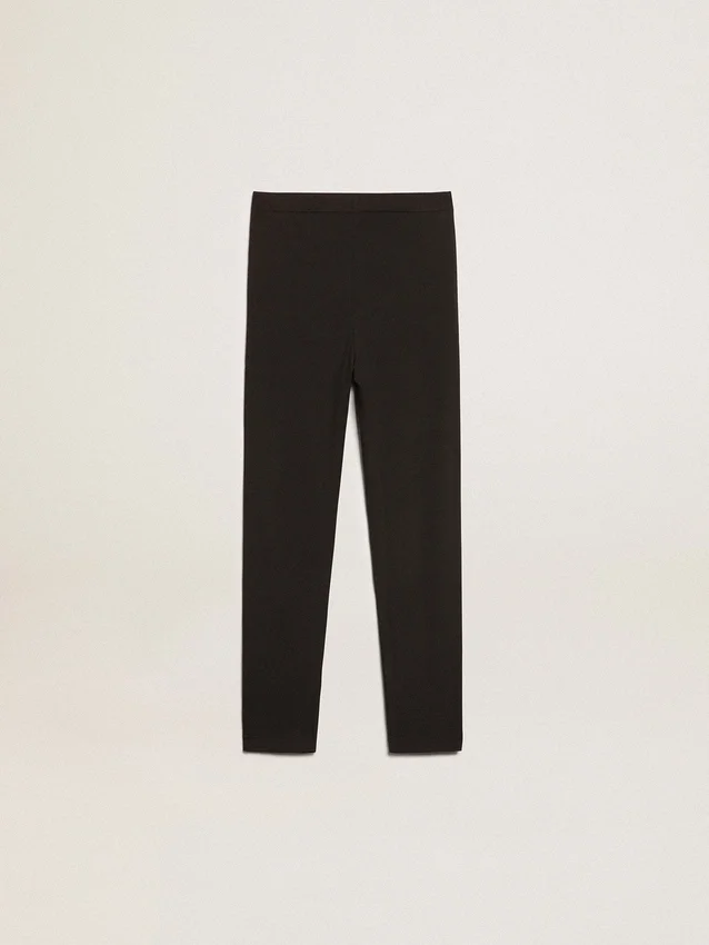 Leggings noirs pour filles avec des étoiles blanches sur les côtés