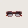Lunettes de soleil Cameron Panthos avec monture couleur miel, pierres précieuses et verres bleus
