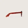 Lunettes de soleil Cameron Panthos avec monture couleur miel, pierres précieuses et verres bleus