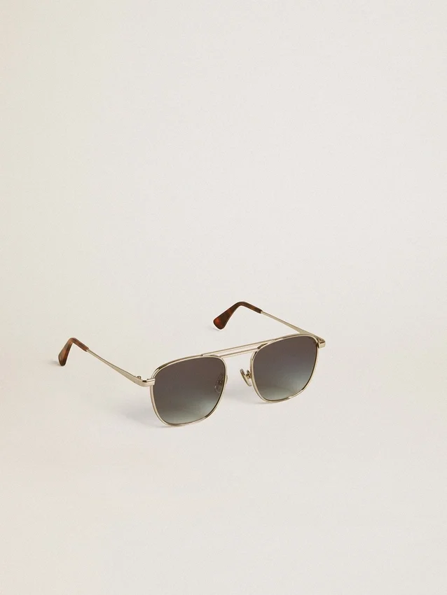 Lunettes de soleil de style aviateur avec monture argentée et verres bleus