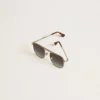 Lunettes de soleil de style aviateur avec monture argentée et verres bleus