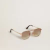 Lunettes de soleil de style aviateur avec monture dorée et verres beiges