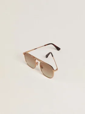 Lunettes de soleil de style aviateur avec monture dorée et verres beiges