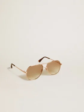 Lunettes de soleil de style aviateur avec monture en or rose et verres couleur miel