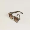 Lunettes de soleil de style Cameron avec motif écaille