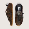 Marathon Speed pour homme en cuir avec imprimé serpent marron, étoile noire et languette de talon en cuir argenté