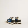 Marathon Young en nylon bleu avec étoile imprimée et languette en cuir au talon