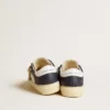 May Young en cuir blanc et bleu avec étoile en cuir et languette au talon