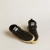 Mid Star pour femme en nappa noir avec étoile pailletée noire et empiècement en daim