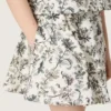 Mini-jupe Journey pour fille en toile de coton blanche à imprimé floral vert