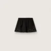 Mini-jupe pour femme en sergé de coton noir avec broderie florale en paillettes