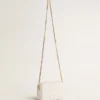 Mini Star Bag en cuir blanc beurre avec étoile ton sur ton