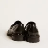 Mocassins épais pour femme en cuir noir clouté