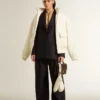 Modèle Forty2 pour femme avec étoile noire et languette de talon en cuir à effet métallisé argenté