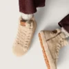Modèle Francy pour femme en peau de mouton beige avec étoile en cuir marron