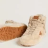 Modèle Francy pour femme en peau de mouton beige avec étoile en cuir marron