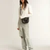 Modèle Hi Star pour femme avec étoile pailletée argentée et languette de talon en nubuck gris tourterelle