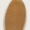 Modèle Hi Star pour femme avec étoile pailletée argentée et languette de talon en nubuck gris tourterelle