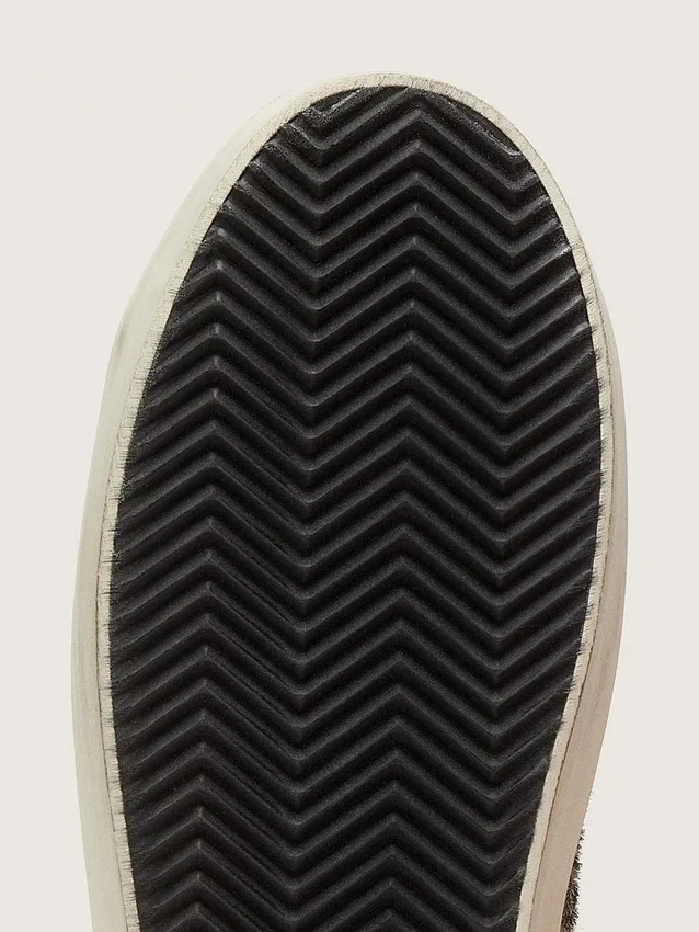 Modèle Hi Star pour femme en cuir de poney noir et blanc avec étoile en cuir blanc