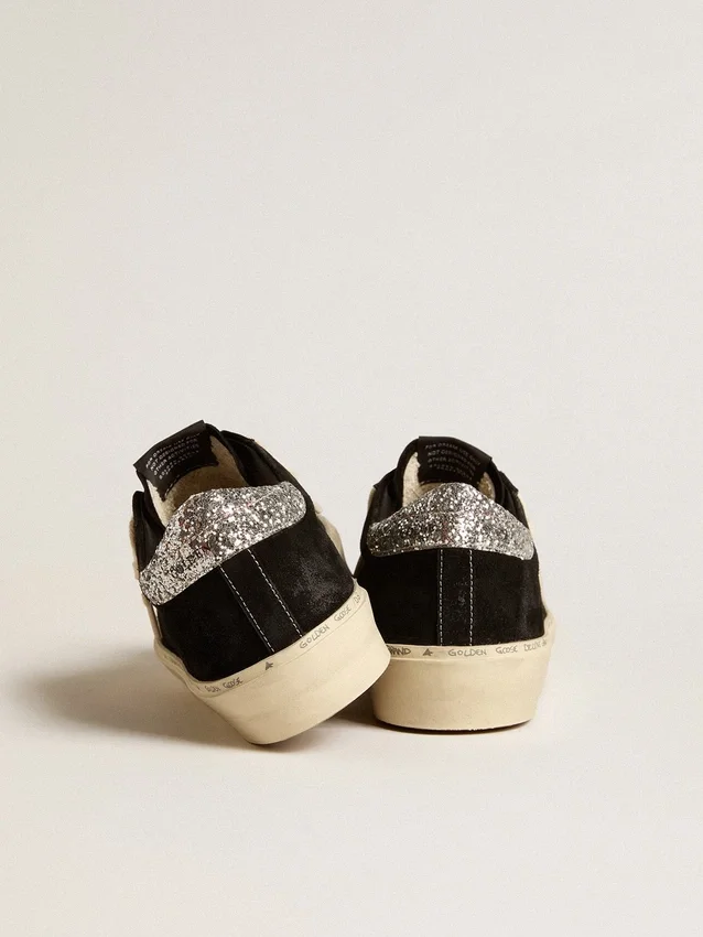 Modèle Hi Star pour femme en cuir noir avec languette de talon à paillettes argentées