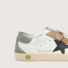 Modèle Old School junior avec étoile en cuir noir et empiècements en daim beige et vert