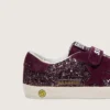 Modèle Old School junior en suède pailleté bordeaux avec étoile et languette au talon en daim bordeaux