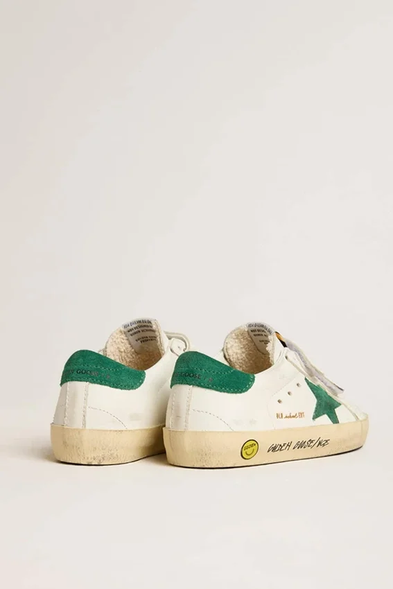 Modèle Old School pour ados avec étoile en daim vert et languette au talon