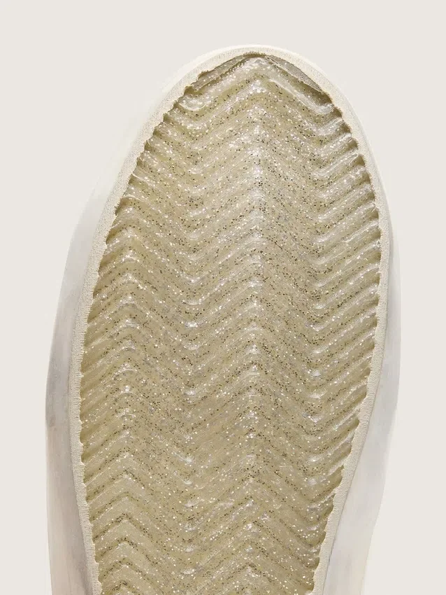 Modèle Old School pour femme avec étoile pailletée argentée et languette en daim gris glacé