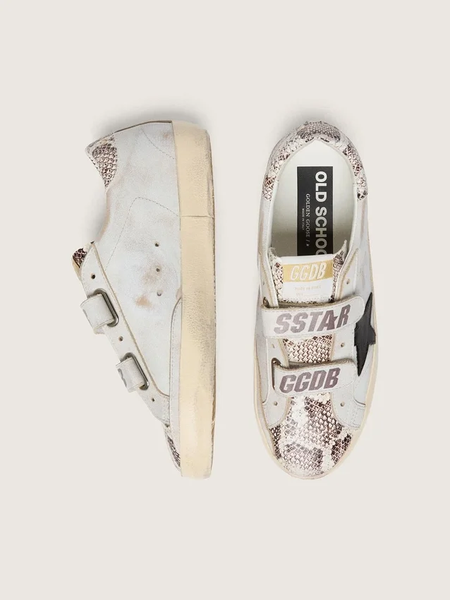 Modèle Old School pour femme en cuir blanc avec étoile en cuir noir et empiècements imprimé serpent