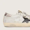 Modèle Old School pour femme en cuir blanc avec étoile en cuir noir et empiècements imprimé serpent