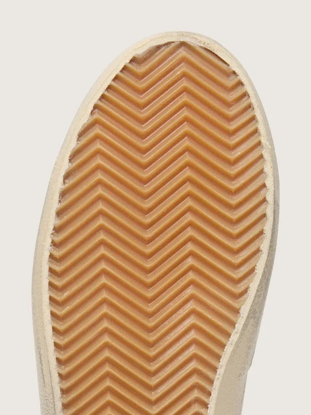 Modèle Old School pour femme en cuir blanc avec étoile en cuir noir et empiècements imprimé serpent