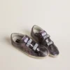 Modèle Old School pour femme en cuir laminé violet avec étoile en nubuck lilas et languette au talon