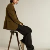 Modèle Stardan pour femme en cuir nappa écru avec étoile pailletée dorée et languette au talon