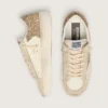 Modèle Stardan pour femme en cuir nappa écru avec étoile pailletée dorée et languette au talon