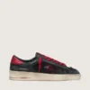 Modèle Stardan pour homme en cuir noir avec étoile rouge, empiècements en mesh noir et en cuir rouge