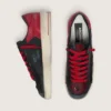 Modèle Stardan pour homme en cuir noir avec étoile rouge, empiècements en mesh noir et en cuir rouge